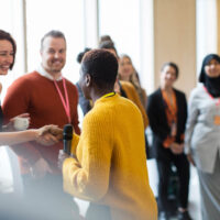 A team receive mental health training in the workplace