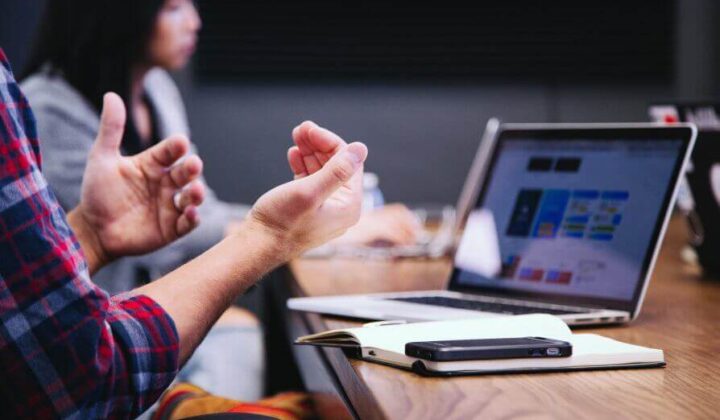 Close up image of laptop and persons hands