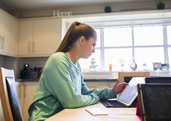 Teenage girl using tablet