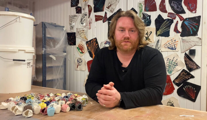 Photo of artist and ceramicist Paul Cummins in his studio