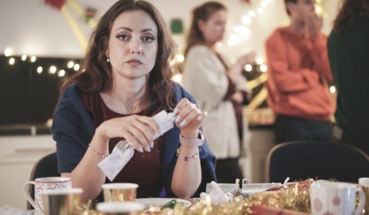 Lady stressed at Christmas table
