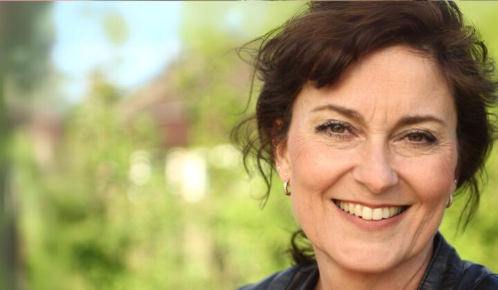 Middle aged person smiling