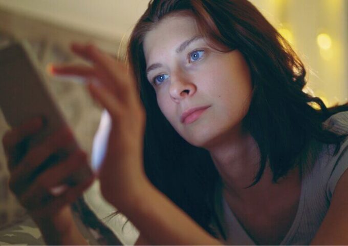 Young lady looking at her mobile