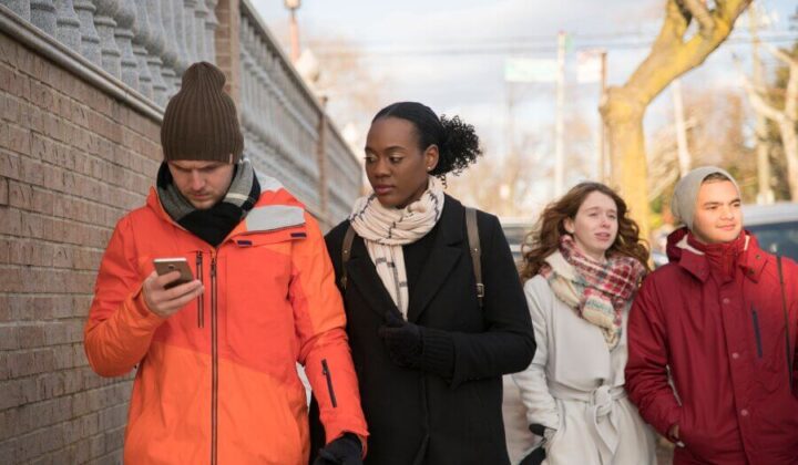 Group of people walking in community