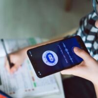 Young person using system AI Chatbot on mobile