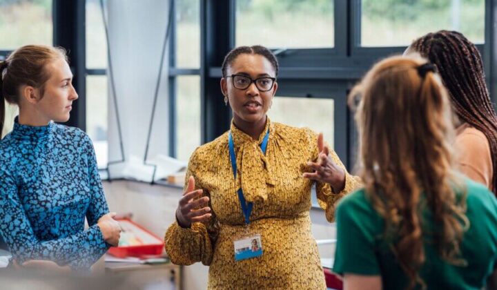 Group of people talking at work