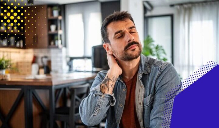 Person holding back of neck with eyes closed