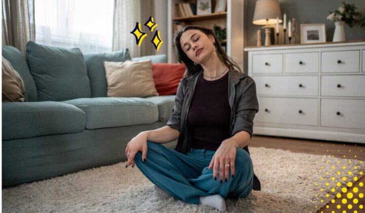 Lady looking relaxed at home sitting cross legged on the floor