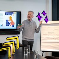 Trainer presenting to a crowd