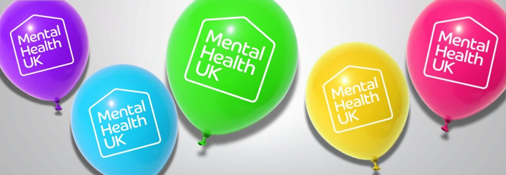 5 MHUK balloons floating