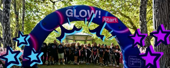 Group of happy people attending Glow night walk