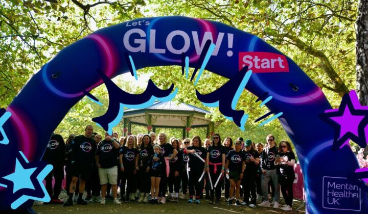 Group of happy people attending Glow night walk