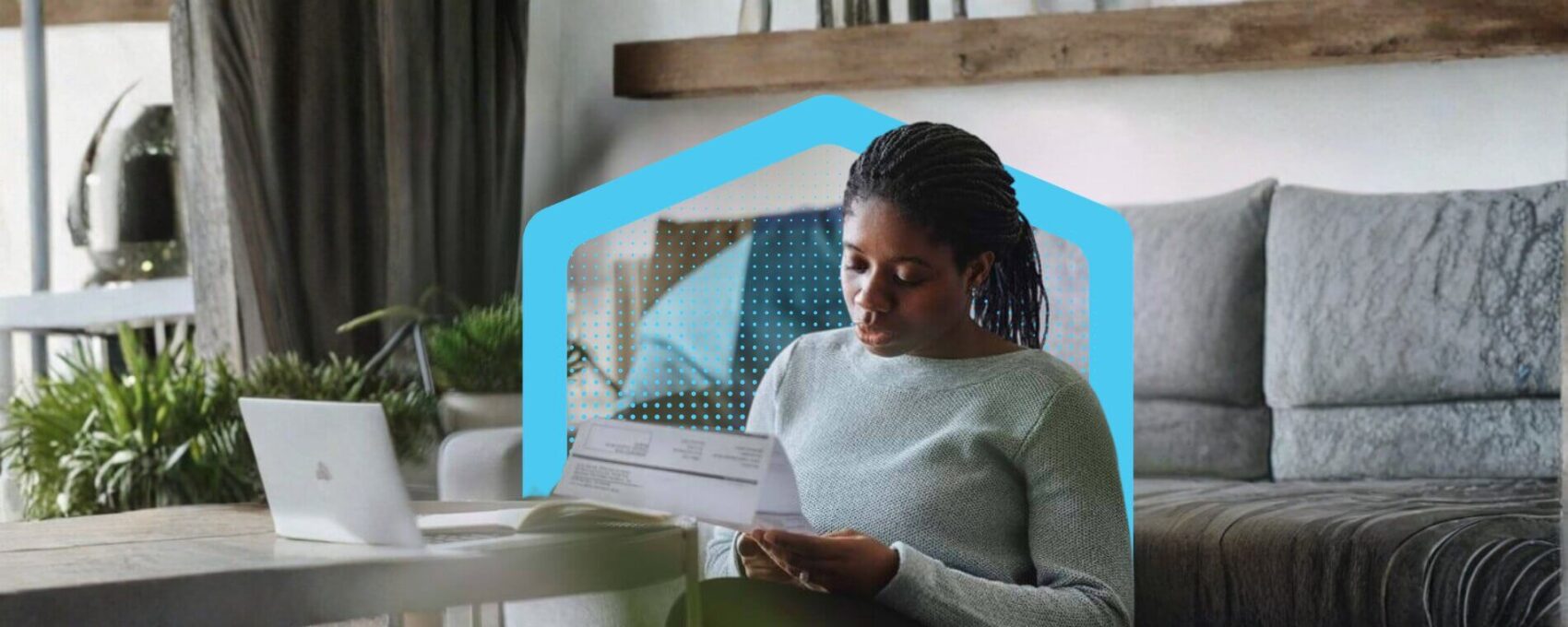 Lady looking at an utility bill at home