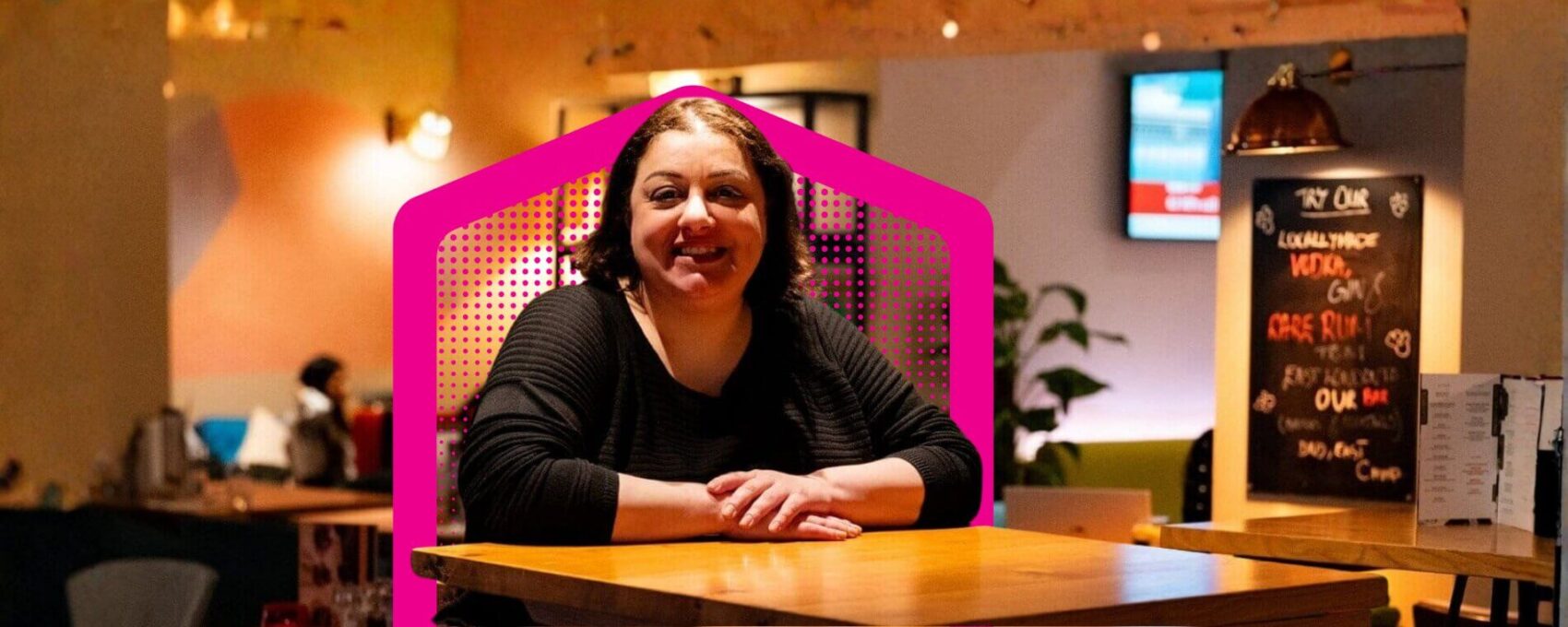 Lady in a restaurant looking content