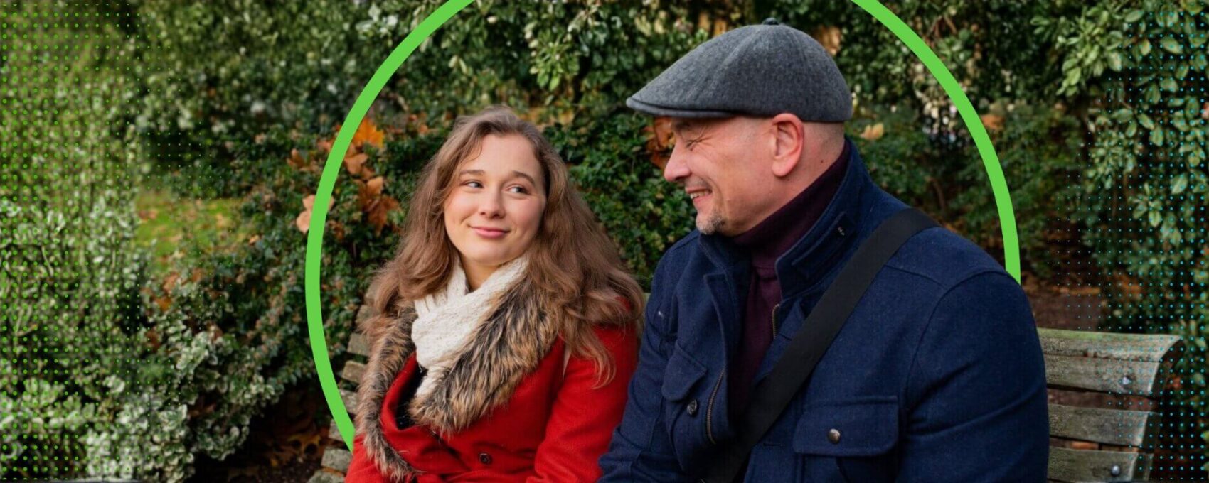 Dad and daughter chatting on a park bench